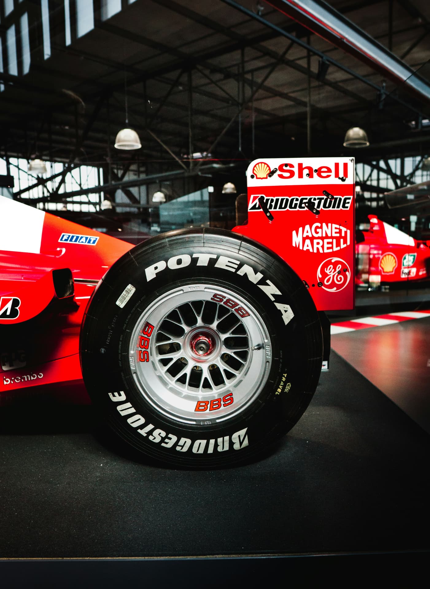 Formula 1 car rear wheel in the team garage